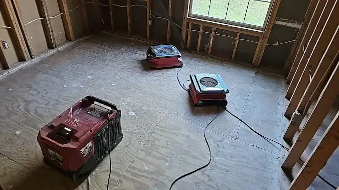 Star Element Restoration technicians extracting water from a flooded Grovetown, GA home