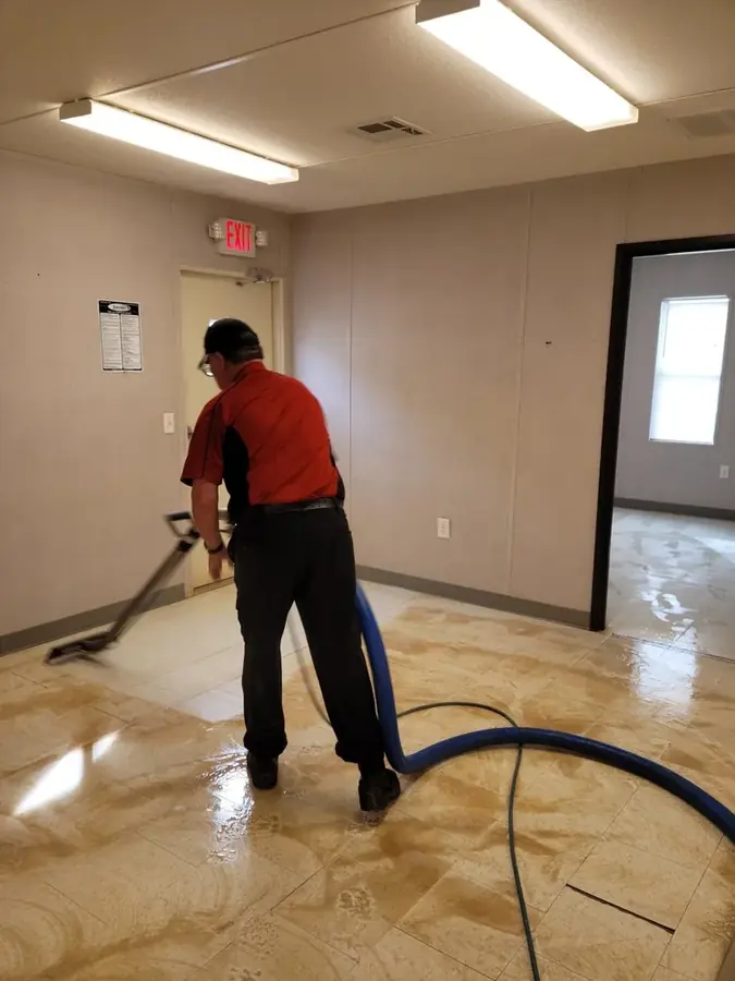 Star Element Restoration technician drying a Grovetown home after water damage